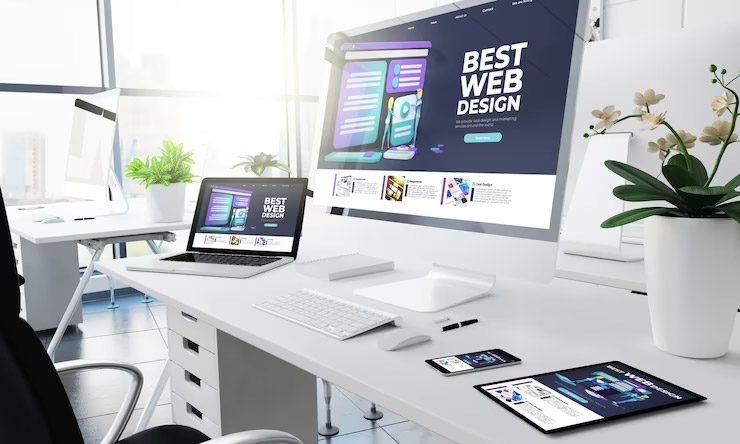 Desk with computer doing website design in Clearwater, FL